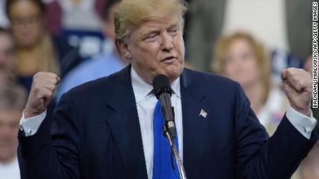 Donald Trump speaks during a rally at the International Exposition Center March 12, 2016 in Cleveland, Ohio. Donald Trump is under fire from rivals who blamed his incendiary rhetoric for a violent outbreak Friday between protesters and supporters at the Republican frontrunner&#39;s rally in Chicago. 