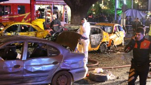 Police work at the site of an explosion in Ankara, Turkey, on Sunday, March 13. The blast killed at least 27 people and wounded at least 75 others, the governor of Ankara said in a written statement.