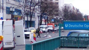 Police converged on the residential area of western Berlin.