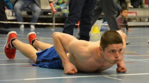 Northwest Territories athlete Chris Stipdonk finishes his gold medal-winning knuckle hop performance. You have to push yourself as far as possible using only the tips of your toes and your knuckles. 