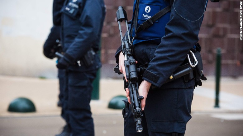 Police stand guard near the scene of a police operation in the Molenbeek-Saint-Jean district in Brussels, on March 18, 2016, as part of the investigation into the Paris November attacks. The main suspect in the jihadist attacks on Paris in November, Salah Abdeslam, was arrested in a raid in Brussels on March 18, French police sources said. / AFP PHOTO / BELGA / AURORE BELOT / Belgium OUTAURORE BELOT/AFP/Getty Images