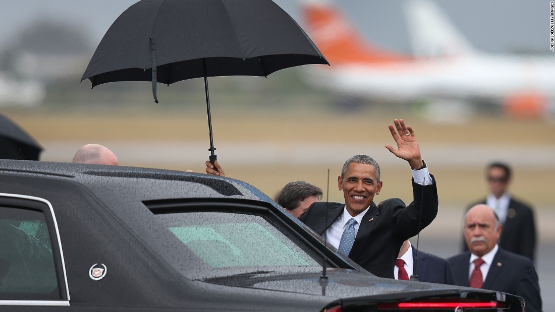 Obama waves shortly after arriving at Jose Marti International Airport.