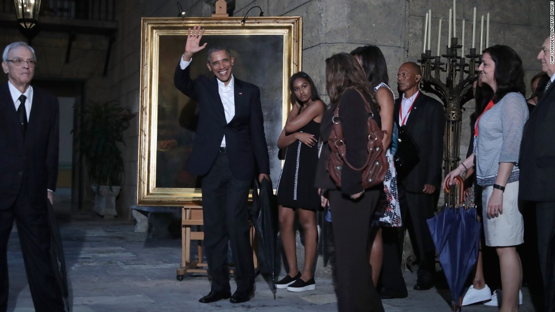 The first family stops to look at a painting of Abraham Lincoln in the Museum of the City of Havana on March 20.