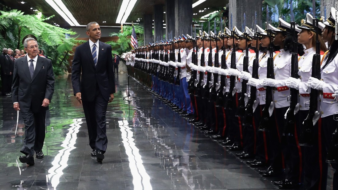 Obama and Castro review troops before bilateral meetings on March 21. 