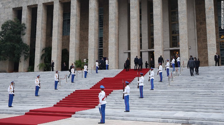 Obama walks up the stairs of the Palace of the Revolution on March 21.  