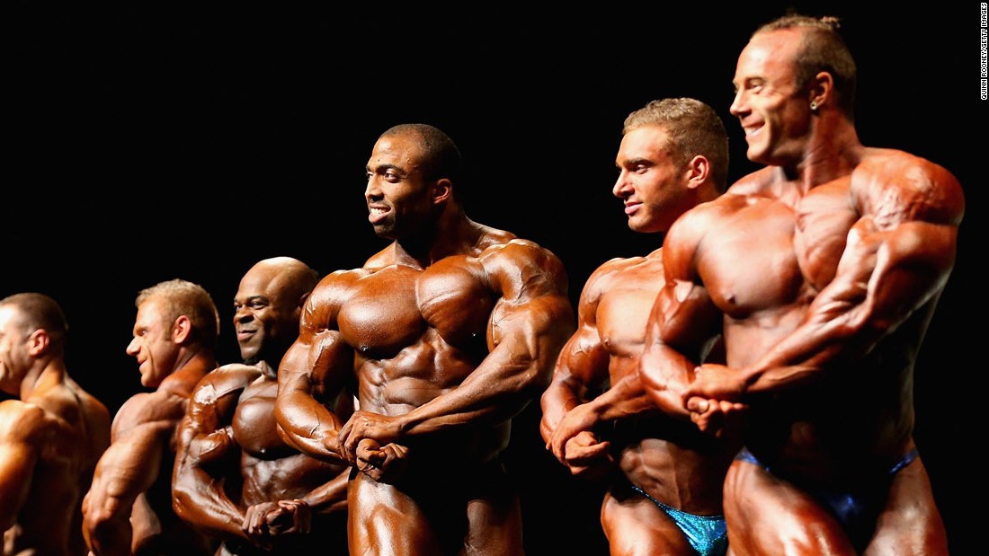 Bodybuilders pose during the Arnold Classic in Melbourne on Saturday, March 19.