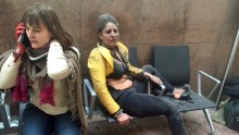 Two wounded women are seen in the Brussels airport.