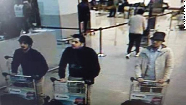 Police say they are looking for the man on the right in connection with the Brussels attack.