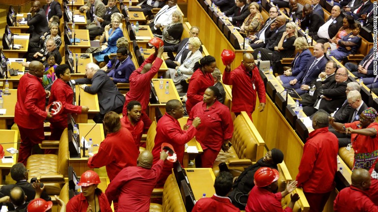 Members of the Economic Freedom Fighters party walk out of Parliament as President Jacob Zuma delivered his state of the nation address in February.