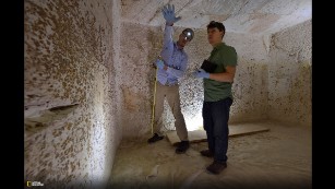 Technicians prepare to scan a wall in a small room next to the burial chamber. Photo credit: Kenneth Garrett/National Geographic/Egyptian Ministry of Antiquities.