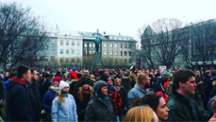 Protesters gather Tuesday outside Iceland&#39;s parliament building.
