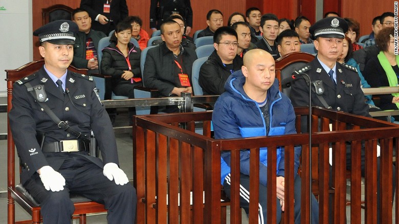 18-year-old Huugjilt was executed for a crime Zhao Zhihong (center) later confessed to. 