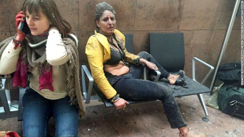 Two wounded women sit in the airport in Brussels, Belgium, after two explosions rocked the facility on Tuesday, March 22. A subway station in the city &lt;a href=&quot;http://www.cnn.com/2016/03/24/europe/brussels-investigation/index.html&quot; target=&quot;_blank&quot;&gt;was also targeted in terrorist attacks&lt;/a&gt; that killed at least 30 people and injured hundreds more. Investigators say the suspects belonged to the same ISIS network that was behind the Paris terror attacks in November.