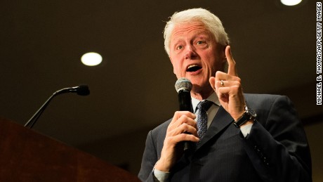 Former US President Bill Clinton speaks to Democratic presidential candidate Hillary Clinton supporters during a rally at the International Association of Machinist and Aerospace Workers Union hall in Bridgeton, Missouri on March 8, 2016. 