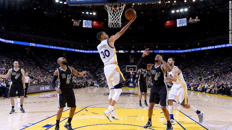 Curry, seen here April 7 against the Spurs at Oracle Arena in Oakland, California, leads the NBA in scoring with 29.9 points per game.