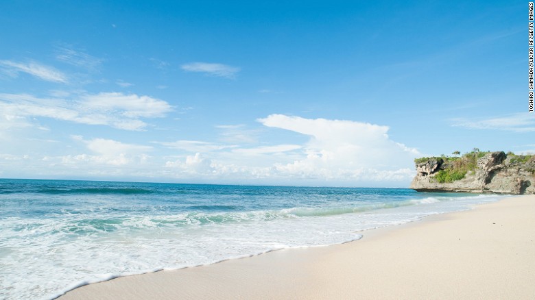 The waves can get high at this beach, making it popular with surfers. Rough water and a sharp ocean floor mean most beach-goers are happy to admire the view. 