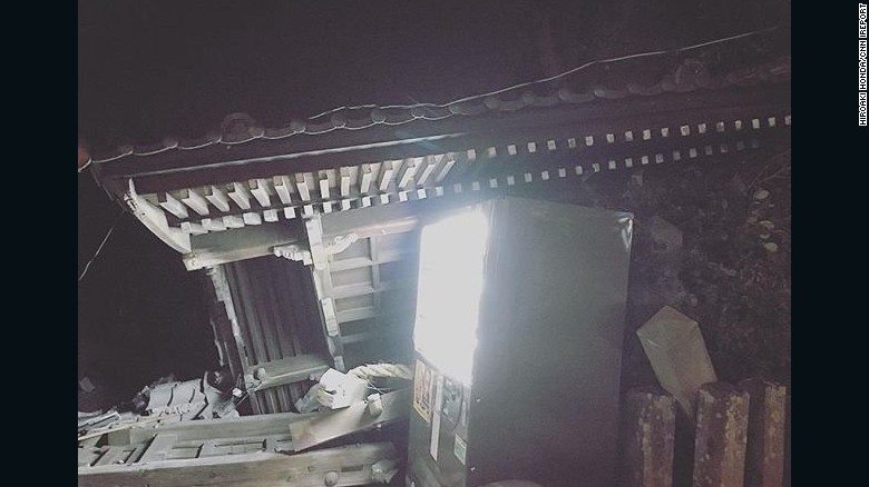 Hiroaki Honda was eating dinner when he felt Thursday&#39;s earthquake. He took this photo of the damaged Kotohira Shrine -- which was largely damaged, except for a vending machine. 

