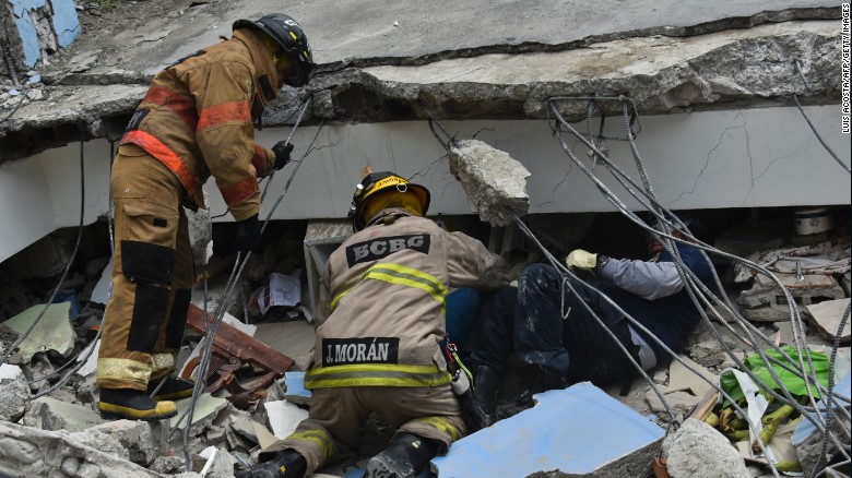 Rescue workers search the rubble of a collapsed building for victims in Guayaquil, Ecuador, on Sunday, April 17. A magnitude-7.8 quake struck off Ecuador&#39;s central coast on Saturday, April 16, flattening buildings and buckling highways. It&#39;s the deadliest quake to strike the South American country in decades.