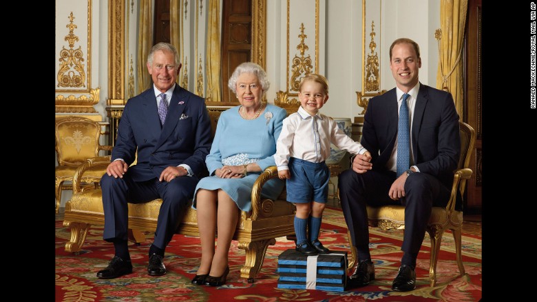 Prince George gets a boost from some foam blocks for a special family photo. The portrait, featuring the four generations of the House of Windsor, was commissioned by the Royal Mail and will be featured on a series of stamps to commemorate the Queen's 90th birthday. 