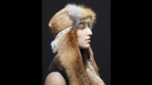 Odelia Graff isn't a gun owner, but she is the daughter of the German Fur Association's president. She told the photographers that it is a pity we need weapons, but we do.