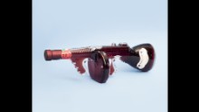 A wine bottle shaped like a machine gun.