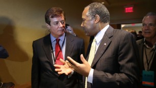 Donald Trump&#39;s political strategist Paul Manafort (L) speaks with former Republican presidential candidate Ben Carson as they arrive for a Trump for President reception with guests during the Republican National Committee Spring meeting at the Diplomat Resort on April 21 2016 in Hollywood, Florida.
