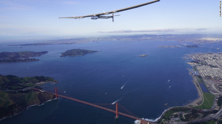 Solar Impulse 2 flies over the Golden Gate Bridge as part of a fly-by of the San Francisco Bay after flying for two and half days from Hawaii.
