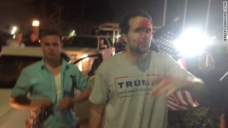 A Trump supporter was bloodied after an altercation during an anti-Trump protest in Costa Mesa, California.