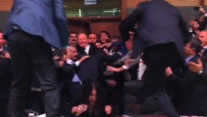 Scuffles break out between members of Turkey's ruling AK Party and pro-Kurdish opposition party during a discussion on whether to remove lawmakers immunity.