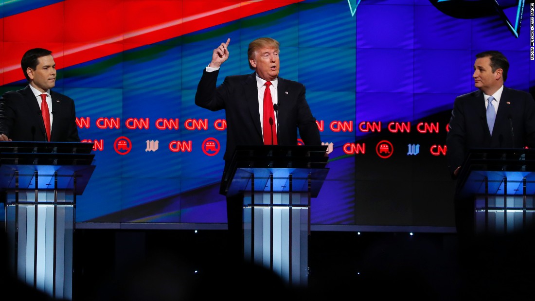 Trump -- flanked by U.S. Sens. Marco Rubio, left, and Ted Cruz -- speaks during a CNN debate in Miami on March 10. Trump dominated the GOP primaries and emerged as the presumptive nominee in May.