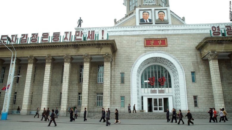 Portraits of former leaders Kim Il Sung and Kim Jong Il look down from the clock tower of Pyongyang Central Railway Station. The station is a major hub for travelers to and from the capital, including many of the delegates for the upcoming Workers&#39; Party Congress, which starts on May 6.