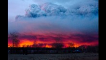 The wildfire moves toward the town of Anzac on Wednesday, May 4. The wildfire began Sunday, May 1, and had torched 24,710 acres by Wednesday, CNN partner CBC News said. The cause of the blaze was unclear.
