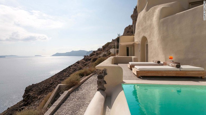 Pool with a panorama: Santorini's Mystique.