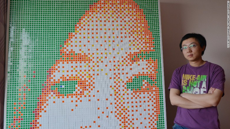 Tong Aonan spent 20 hours building the portrait of out of Rubik's cubes. 