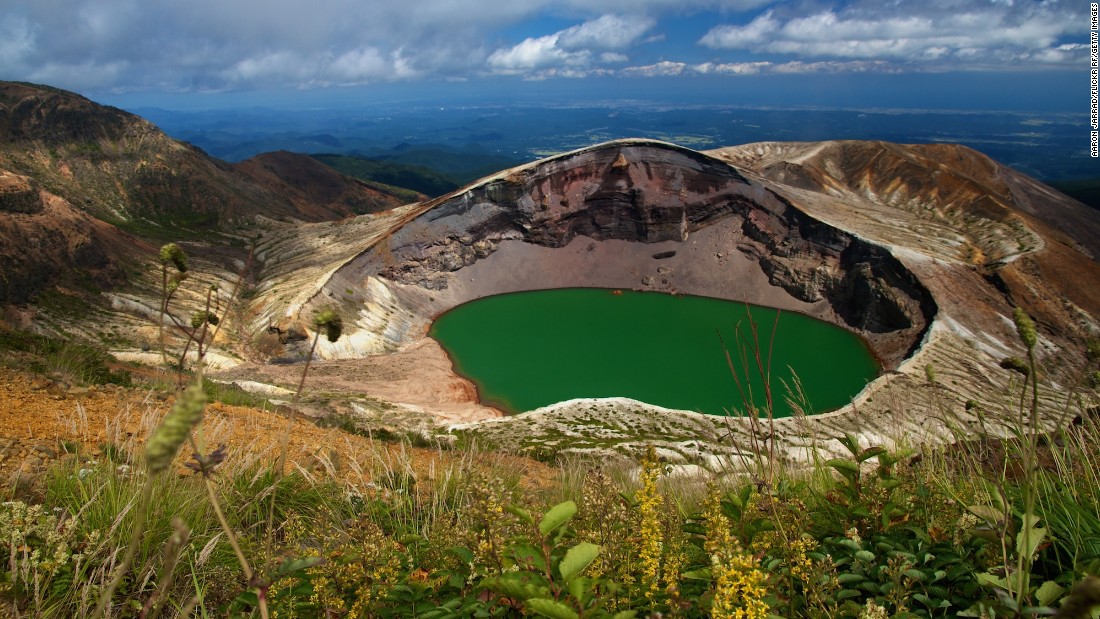 Three peaks of Tohoku's Zao mountain range surround this circular crater lake named after "kama," a traditional iron pot that shares its shape. It sits on the border between Yamagata and Miyagi prefectures.