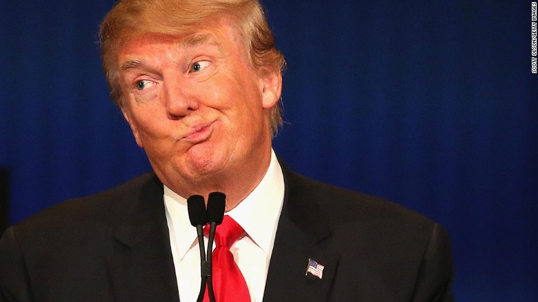 MILWAUKEE, WI - NOVEMBER 10: Presidential candidate Donald Trump gestures after Carly Fiorina says she met with Russian President Putin at a one on one meeting, during the Republican Presidential Debate sponsored by Fox Business and the Wall Street Journal at the Milwaukee Theatre November 10, 2015 in Milwaukee, Wisconsin. The fourth Republican debate is held in two parts, one main debate for the top eight candidates, and another for four other candidates lower in the current polls. (Photo by Scott Olson/Getty Images)