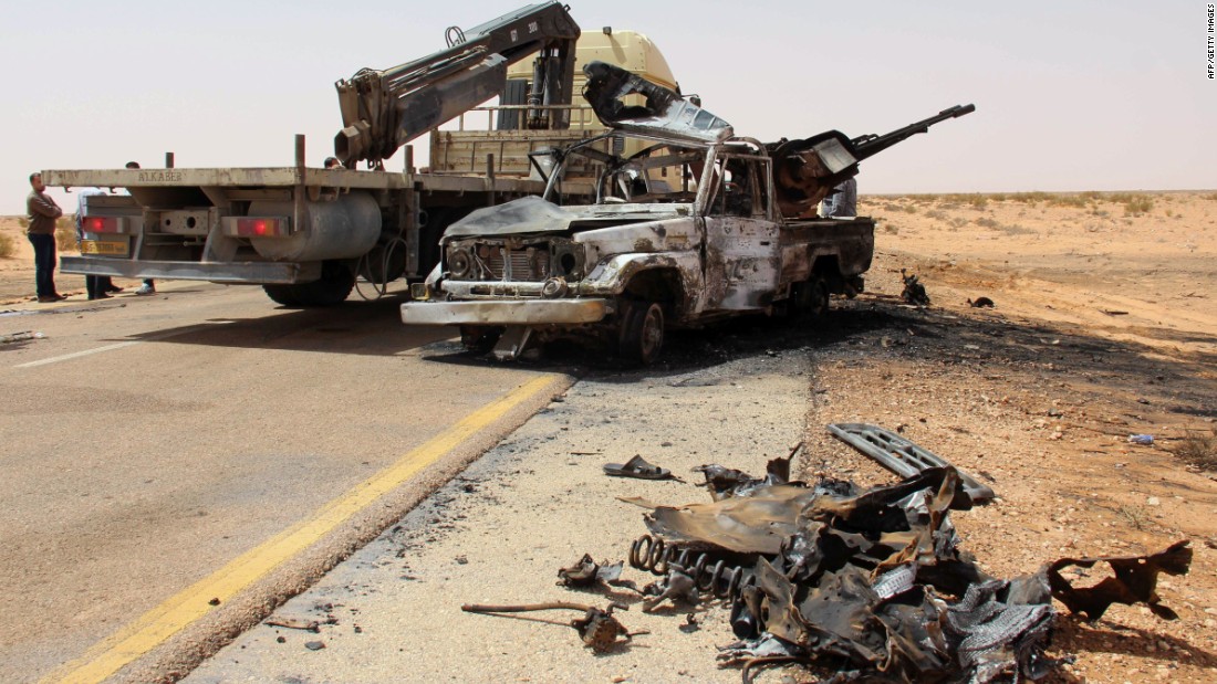 A truck removes the wreckage following a bomb attack near Misrata in April.