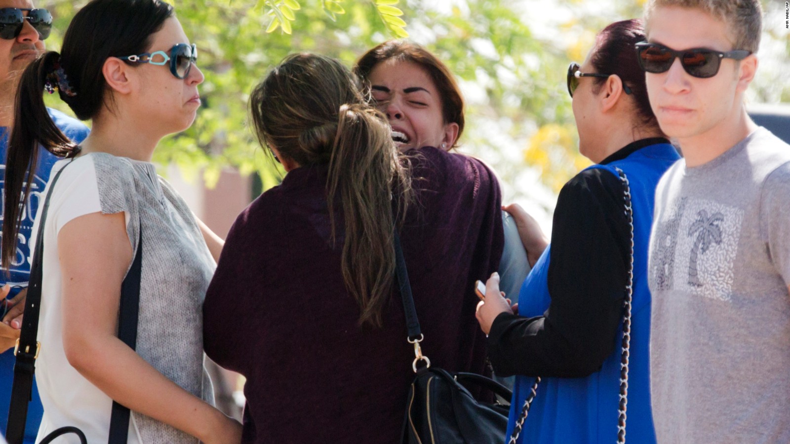 Relatives of passengers on the vanished EgyptAir flight comfort each other at Cairo International Airport, Egypt, Thursday, May 19. EgyptAir Flight 804 vanished from radar with 66 people aboard.