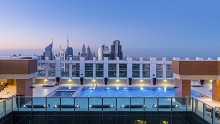 Sheraton has 525 branded hotels around the planet. Its glitziest is the 54-story Grand Hotel Dubai.