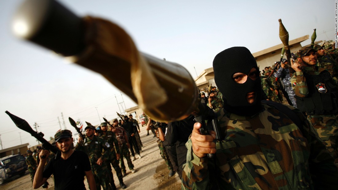 Members of the Saraya al-Salam (Peace Brigades), a group formed by Iraqi Shiite Muslim cleric Moqtada al-Sadr, march in Iraq&#39;s holy city of Najaf as they prepare to reinforce government forces in the fight against the Islamic State group for control of Fallujah, east of the capital, on May 17, 2016. Iraqi security forces and allied fighters have regained significant ground from the jihadists, securing the Ramadi area earlier this year and retaking the town of Heet last month. But parts of Anbar -- including Fallujah -- are still under IS control, as is most of Nineveh province, to its north. / AFP / HAIDAR HAMDANI (Photo credit should read HAIDAR HAMDANI/AFP/Getty Images)