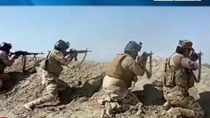 Iraqi forces and militias battling ISIS in Falluja