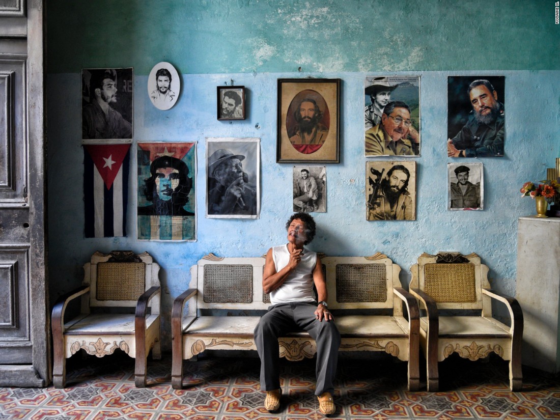 Romaine W says he was drawn to this museum-like house in Havana. "As Cubans are always welcoming to guests I decided to take a peek inside, only to find out that this was actually a home containing collectible items from vinyl records to a large scale American flag, then to this wall of icons; decorated with a Cuban flag, revolutionary fighters and past and present Cuban leaders." (<a href="http://travel.nationalgeographic.com/photographer-of-the-year-2016/" target="_blank">Click here to enter NatGeo photo contest</a>)