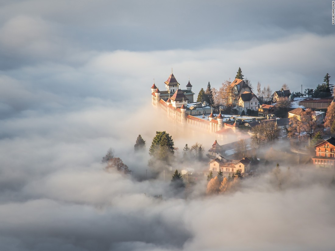 Boukhechina Malik climbed above low clouds to shoot this image in Sonchaux, Switzerland. "I thought I was immersed in a fairytale, out of every human scale." (<a href="http://travel.nationalgeographic.com/photographer-of-the-year-2016/" target="_blank">Click here to enter NatGeo photo contest</a>)