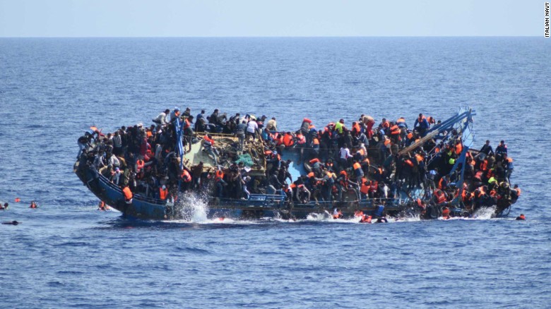 Terrifying scene as migrant ship capsizes