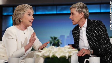 Clinton repeats shimmy, accuses Trump of stalking her on stage