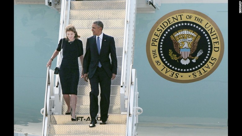 President Barack Obama and U.S. Ambassador to Japan Caroline Kennedy arrive at the Marine Corps&#39; Air Station Iwakuni in the western Japanese city.
