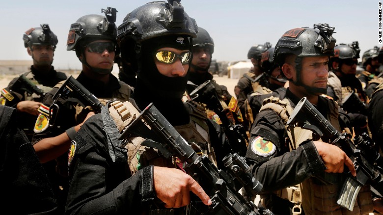 Iraq&#39;s elite counter-terrorism forces gather ahead of an operation to retake Falluja on Sunday, May 29.
