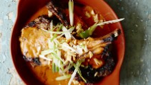 These griddled lamb cutlets, cooked by Adjonyoh, are served with a spicy groundnut sauce. She makes <a href="http://zoesghanakitchen.co.uk/day-2-groundnut-stew-and-pounding-fufu/" target="_blank">her groundnut stew </a>with peanut butter, goat, herring, salmon, crabs, onion, tomatoes, garlic and hot peppers. 