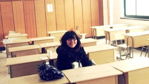 Shen Lu revisits her old high school classroom in 2011, two years after taking the gaokao.