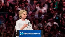BROOKLYN, NY - JUNE 7: Democratic presidential candidate Hillary Clinton gestures to the crowd at the start of her remarks during a primary night rally at the Duggal Greenhouse in the Brooklyn Navy Yard, June 7, 2016 in the Brooklyn borough of New York City. Clinton  has secured enough delegates and commitments from superdelegates to become the Democratic Party's presumptive presidential nominee. She will become the first woman in U.S. history to secure the presidential nomination of one of the country's two major political parties. (Photo by Drew Angerer/Getty Images)